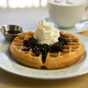 Mixed berry waffle with coffee